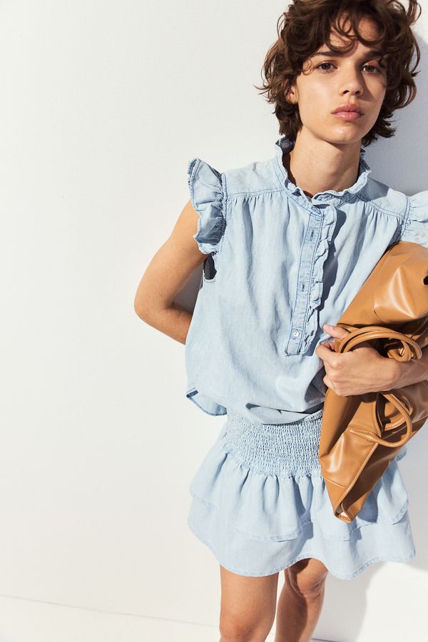 Blusa denim con manga circular