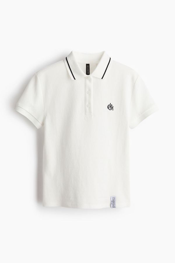 Polo camisero de piqué con motivo bordado