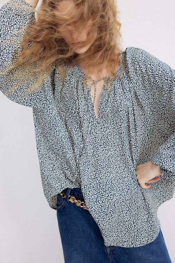 Blusa oversize de crepé