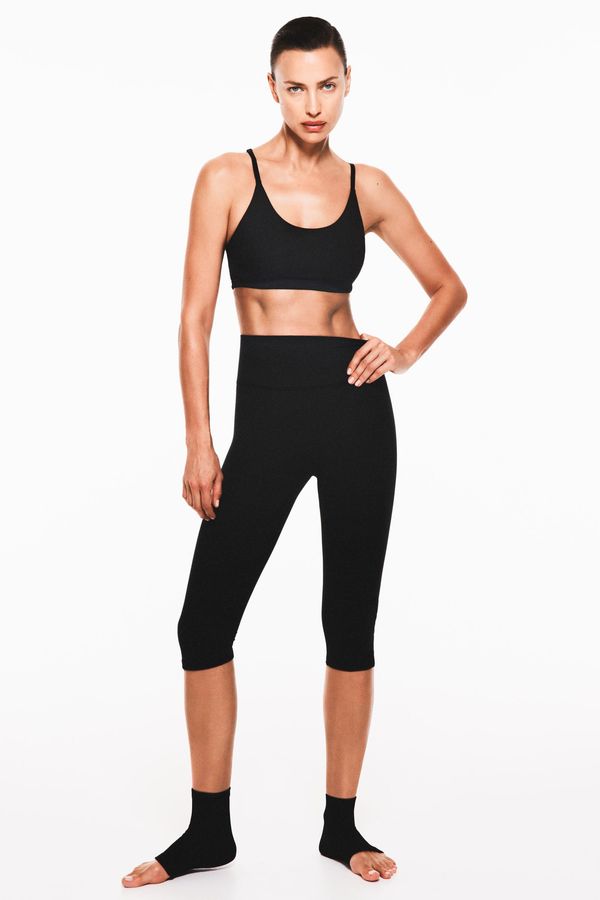 Leggings capri de deporte en SoftMove™