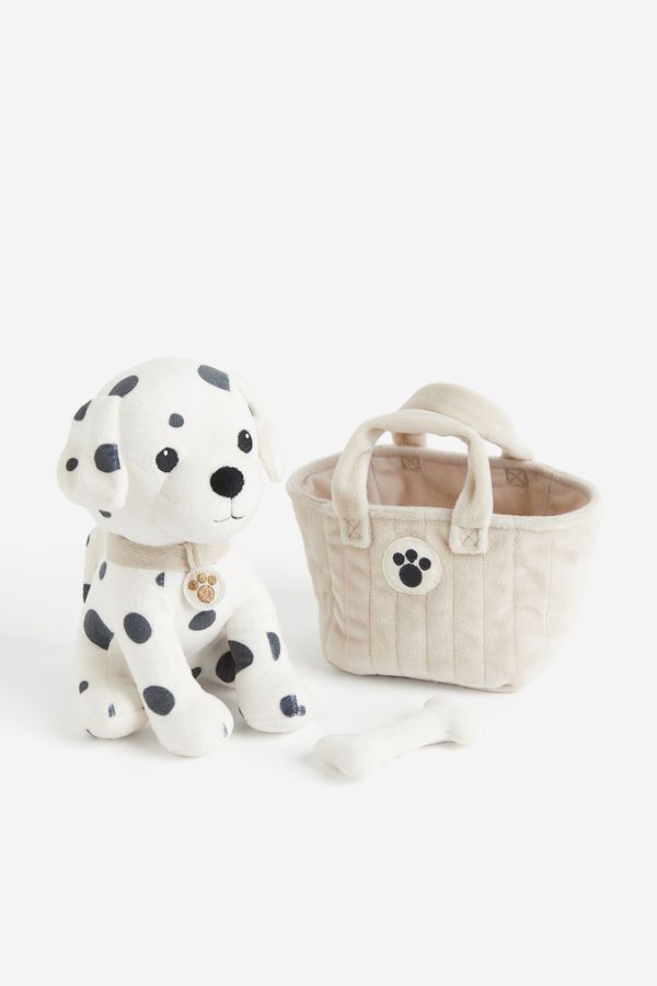 Perro de peluche con bolsa