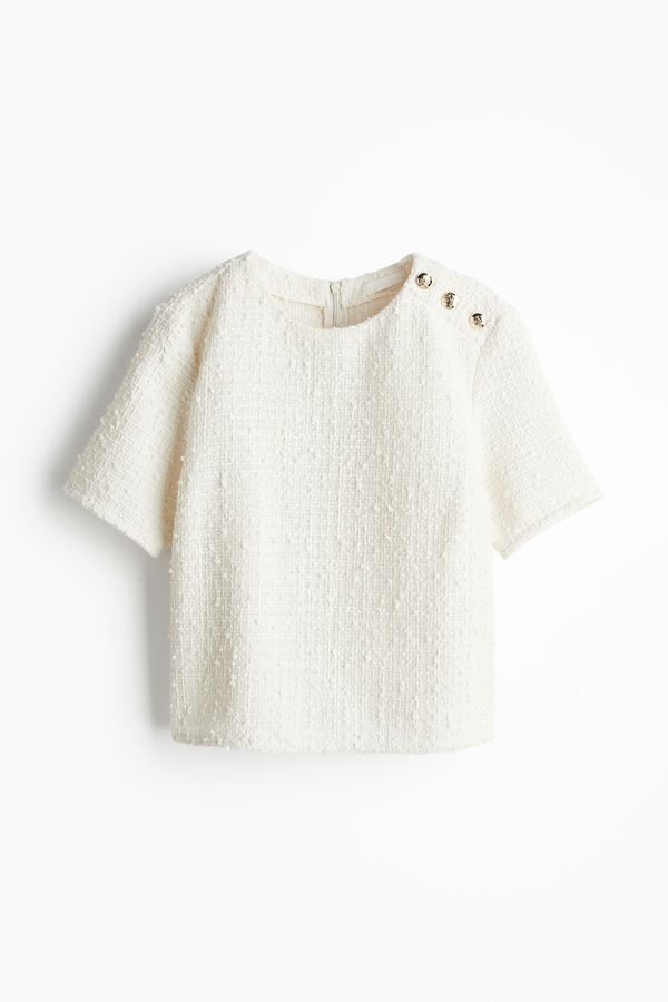 Blusa de bouclé