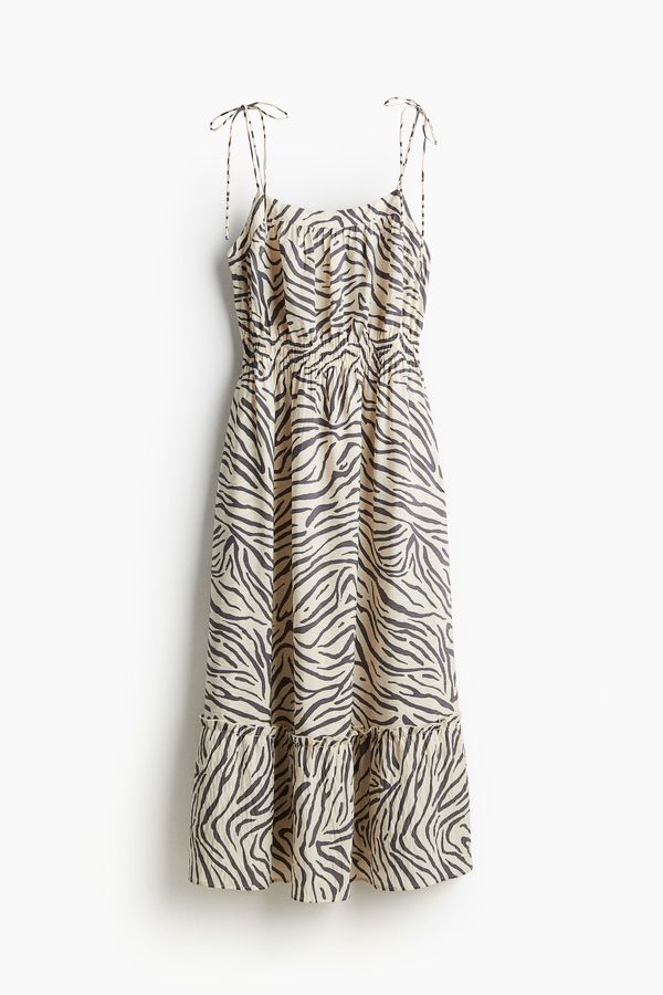 Vestido midi con tirantes de lazo