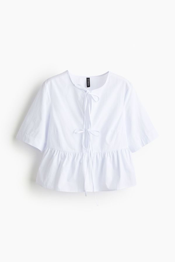 Blusa de popelina con tiras para anudar