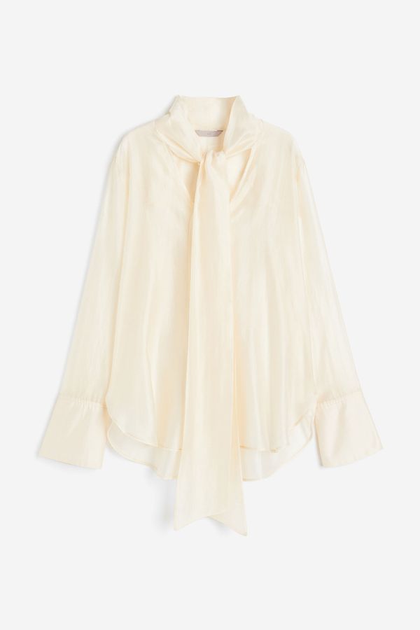 Blusa con tira para anudar
