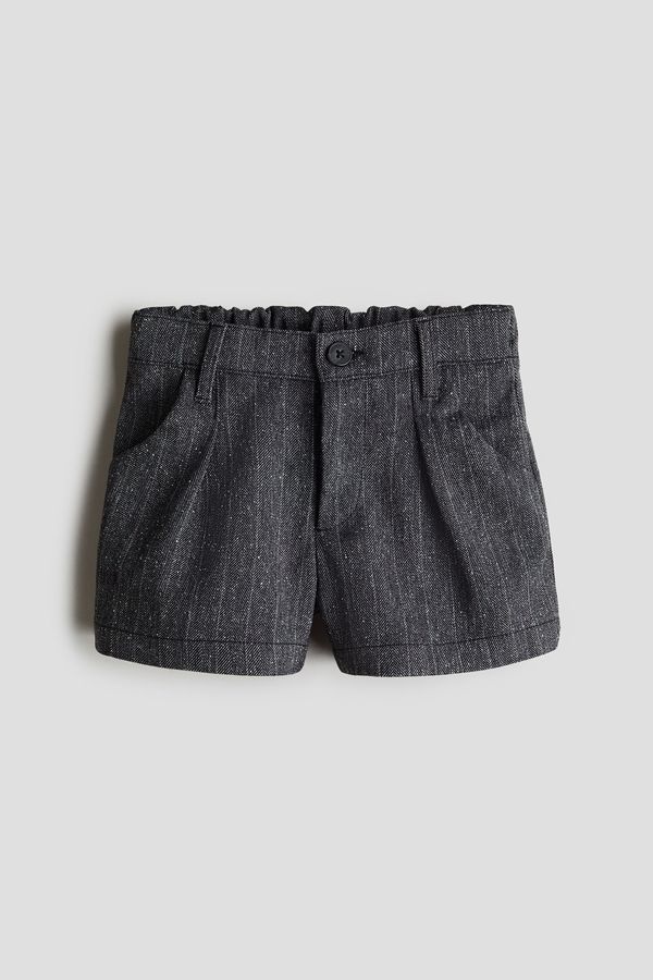 Short con pinzas