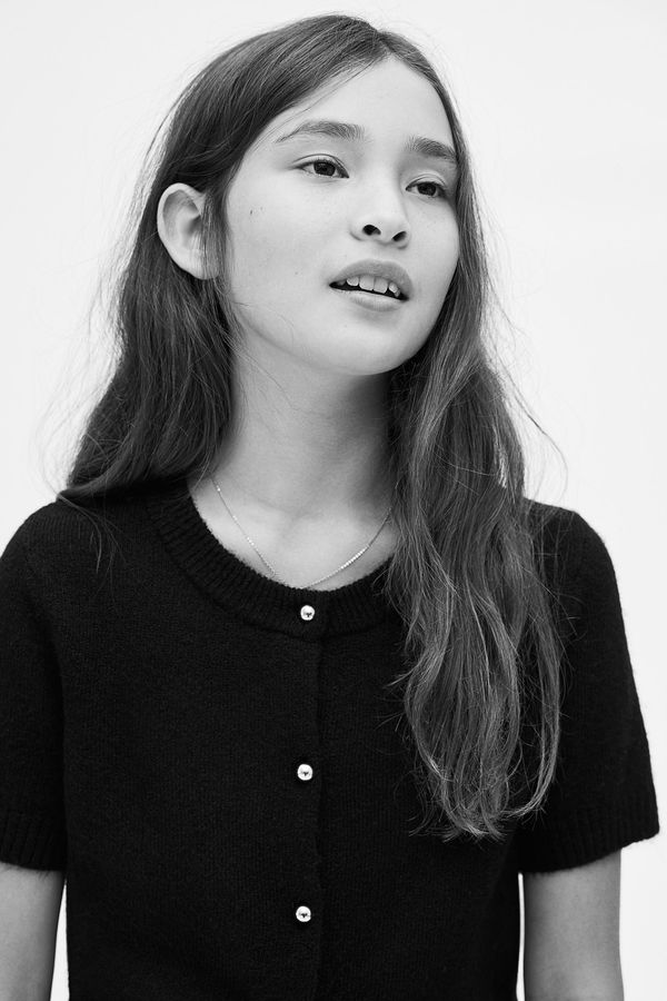 Cardigan de manga corta tejida en punto fino