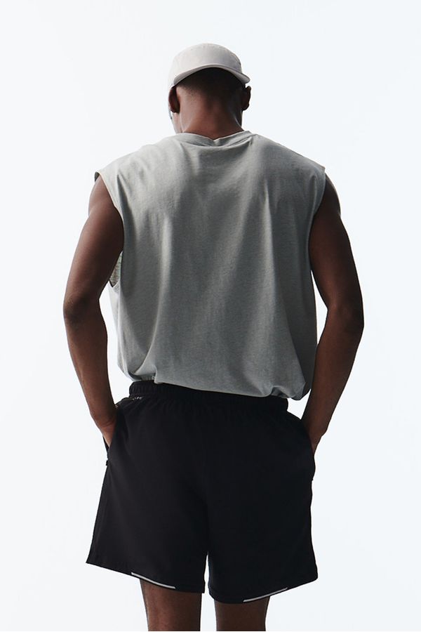 Short de correr a media pierna