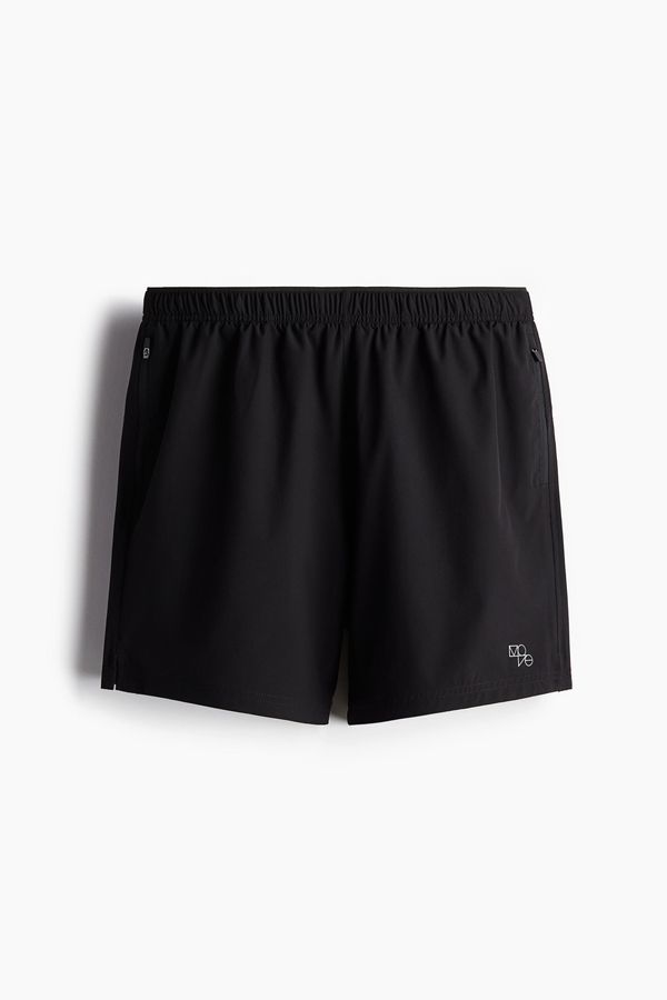 Short de correr a media pierna