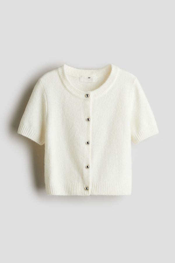 Cardigan de manga corta tejida en punto fino