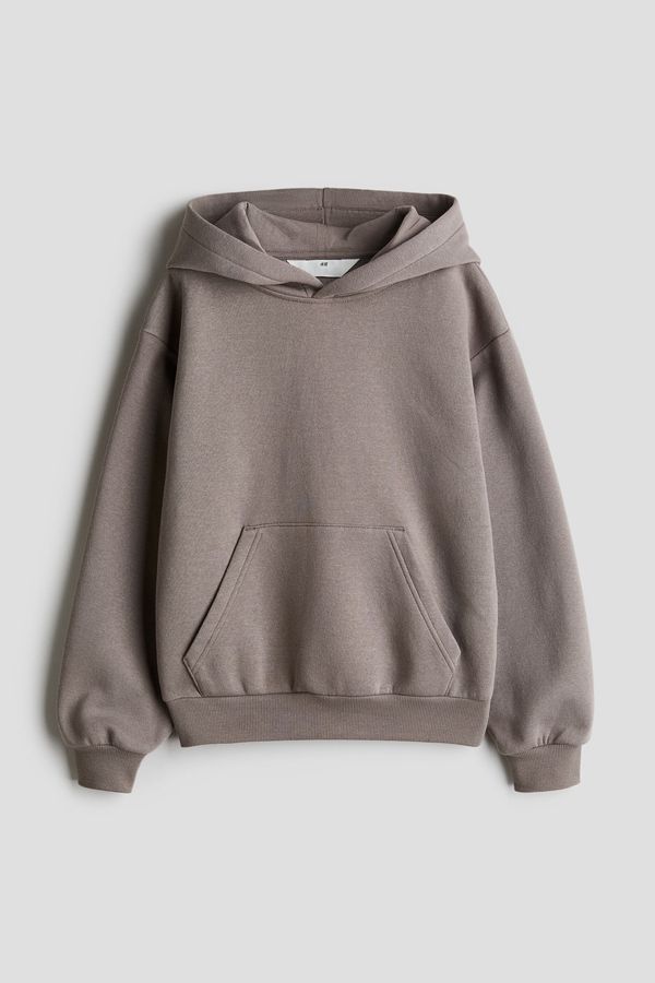 Polera oversize con capucha