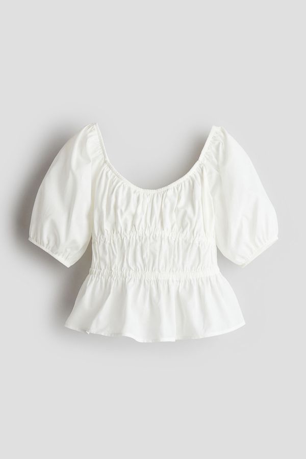 Blusa de algodón con peplum