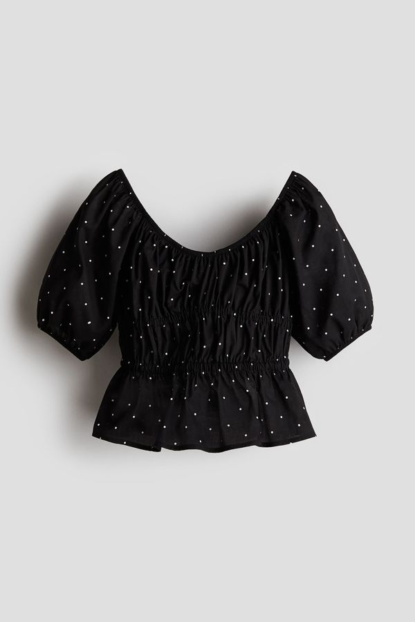 Blusa de algodón con peplum